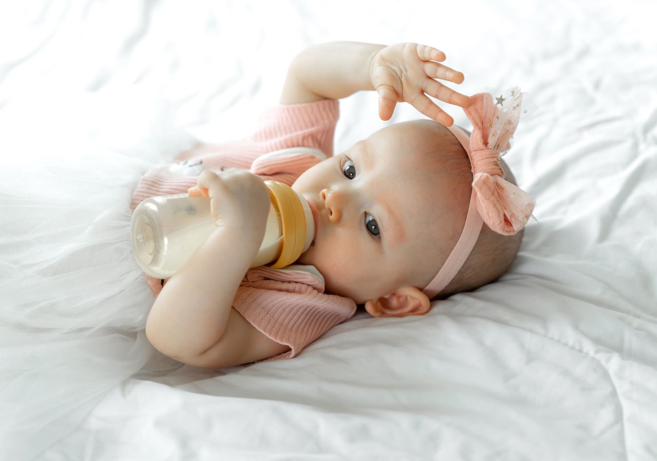 dojenček
flaška
mleko po flaški
adaptirano mleko
mleko po flaški